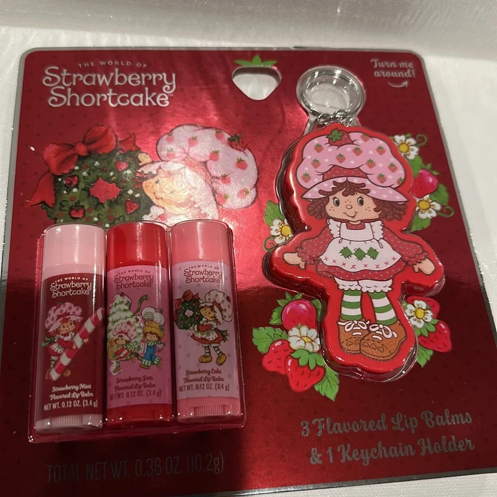 Strawberry Shortcake (3) Flavored Lip Balms and Key Chain Holdet for Lip Balms.